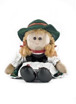 Rag doll in national (folk) Austrian costume isolated over white