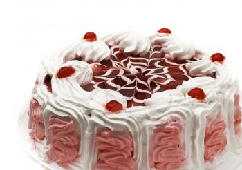 Tasty iced cake with cherries and beautiful red pattern
