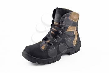 Warm leather boot for wearing in winter or traveling isolated over white