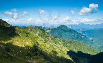 Carpathian mountains in Ukraine: landscape and blue sky in summer