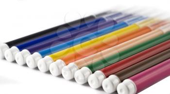 Colorful markers (felt-tip pens) over white background (shallow DOF)