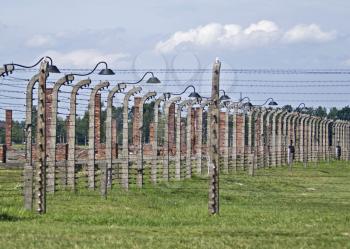 Wire fence and stoves in Birkenau concentration camp, Poland