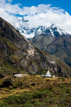 Buddhist stupe or chorten and summits in Himalayas. Religion in Nepal
