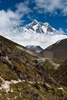 Lhotse and Lhotse shar peaks. Village and tourists