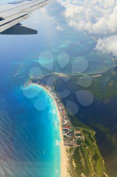 View of the Caribbean Sea from the board of the airplane.