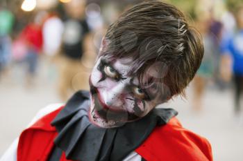 Jackson, USA-September 24, 2016: Street performer in Halloween costume and makeup is entertaining crowds.