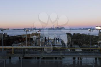Staten Island, NY-February 19, 2917: View of Manhattan from Staten Island Ferry terminal. Ferry carries over 21 million passengers annually on the 5.2-mile (8.4 km) run.