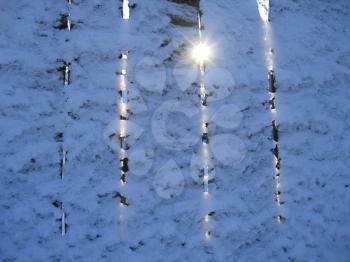 sun and wooden wall. winter background.