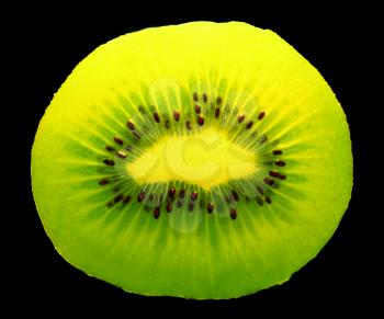 closeup of a kiwi fruit inside with seeds on dark background          