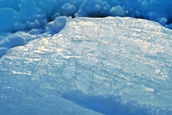 closeup of blue ice with sunlight