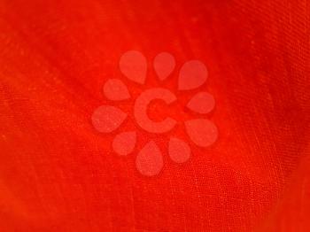 Red wavy fabric closeup background