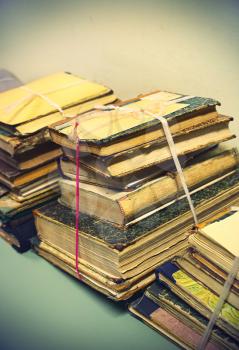 Stacks of very old books