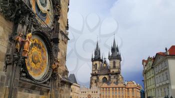 Tyn Cathedral (Church of St. Mother before Tyn) and Old Town Hall Tower (Staromestska Radnice) with Astronomical Clock in Prague, Czech Republic