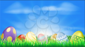 Bright Easter eggs background with pretty decorated Easter eggs in the grass