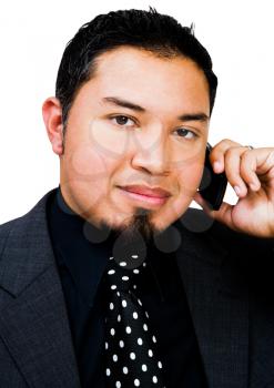 Royalty Free Photo of a Businessman Talking on a Phone