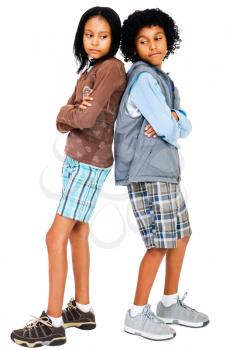 Royalty Free Photo of Two Girls Standing Back to Back