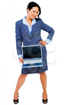 Royalty Free Photo of a Businesswoman Posing and Holding a Laptop