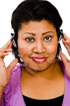 Royalty Free Photo of a Woman Listening to Headphones