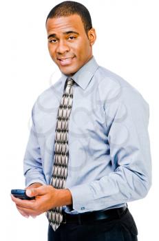 Royalty Free Photo of a businessman Holding a Cellullar Phone