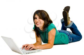 Royalty Free Photo of a Woman Lying on the Floor Using her Laptop and Smiling