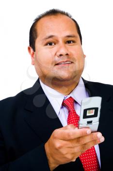 Royalty Free Photo of a Businessman Texting on his Mobile Phone