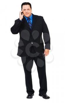 Royalty Free Photo of a Businessman Talking on his Mobile Phone