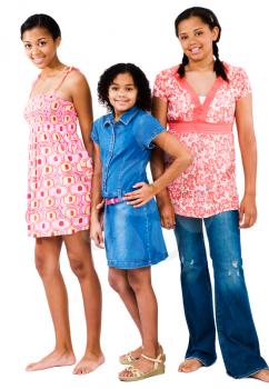 Royalty Free Photo of Three Young Girls Standing Together Smiling