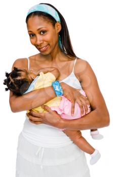 Royalty Free Photo of a Woman Carrying her Baby