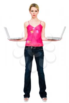 Royalty Free Photo of a Woman Holding Two Laptops
