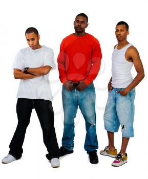 Portrait of three young men posing isolated over white