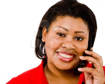 Close-up of a woman talking on a mobile phone isolated over white