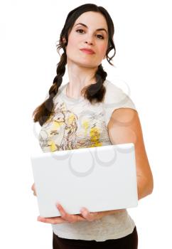 Close-up of a young woman holding a laptop isolated over white
