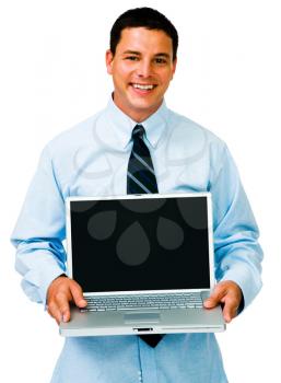 Businessman holding a laptop and smiling isolated over white