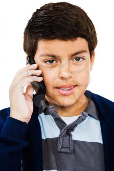 Caucasian boy using a mobile phone isolated over white
