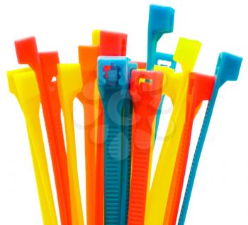 Multi colored cable ties isolated over white
