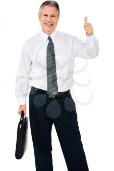 Smiling businessman showing thumbs up sign isolated over white