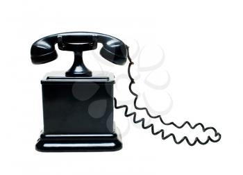 Old black color telephone isolated over white