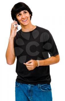 Young man talking on a mobile phone isolated over white