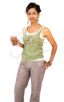 Happy young woman drinking chocolate shake isolated over white