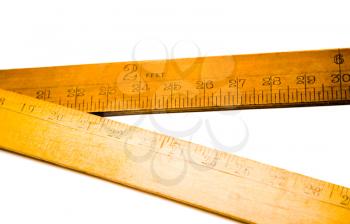 Two wooden rulers isolated over white