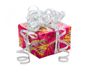 Gift decorated with a ribbon isolated over white