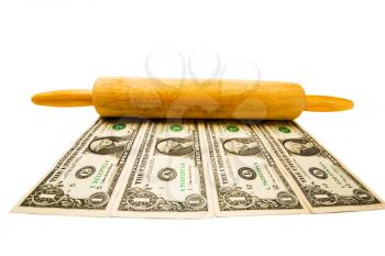 US paper currency with a rolling pin isolated over white
