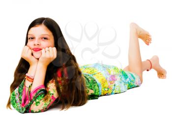Lying girl posing and smiling isolated over white
