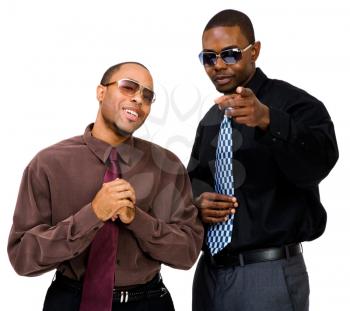 Close-up of businessmen posing and smiling together isolated over white