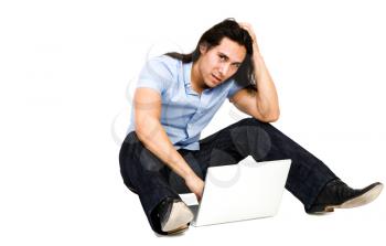 Man using a laptop isolated over white
