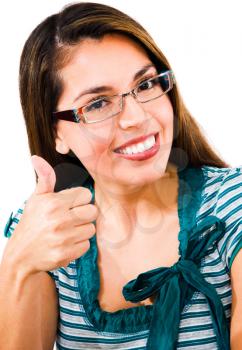 Woman showing her thumb and smiling isolated over white