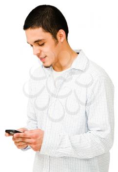 Young man using a mobile phone isolated over white