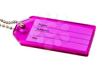 Pink color key chain isolated over white