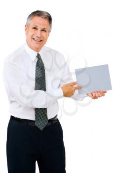 Happy businessman showing a placard isolated over white