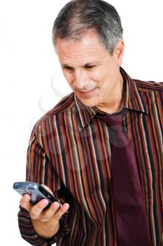Businessman text messaging on a mobile phone isolated over white